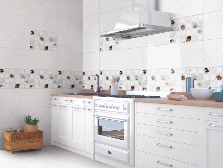 Modern open kitchen design with white cabinets, patterned wall tiles, and a sleek cooking space.